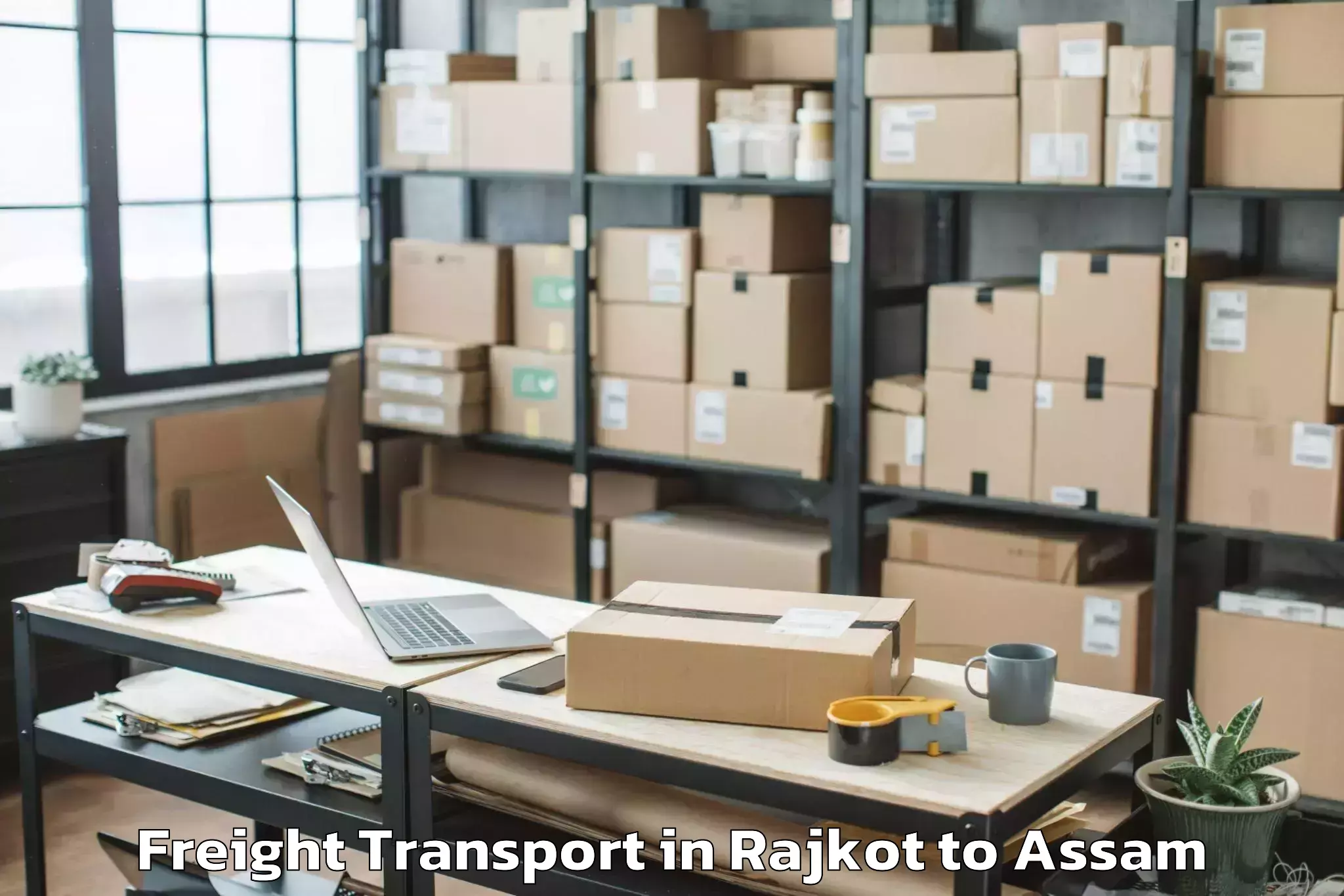 Top Rajkot to Abhilashi University Jorhat Freight Transport Available